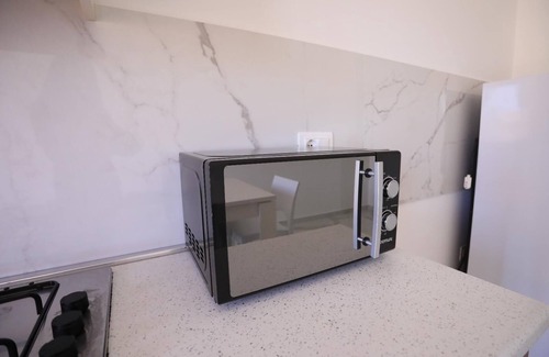 Parghelia Apartment | Cozy apartment with city view equipped with every comfort.