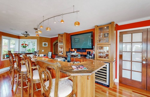 Mid-Hillside Apartment | Cozy apartment with large deck with views, hot tub & wood stove