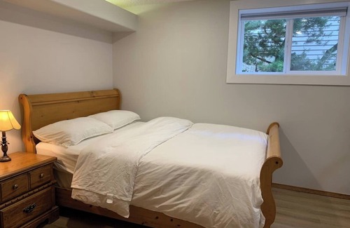 Southwest Calgary Bed & Breakfast | cozy bedroom near C-train station