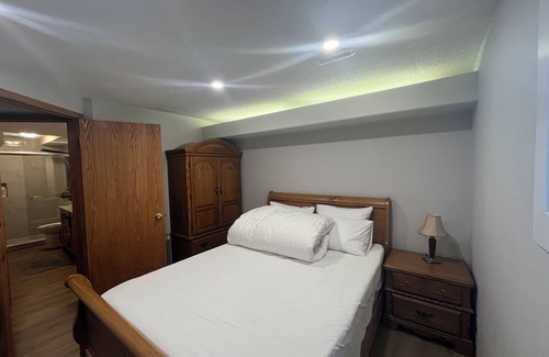 Southwest Calgary Bed & Breakfast | cozy bedroom near C-train station