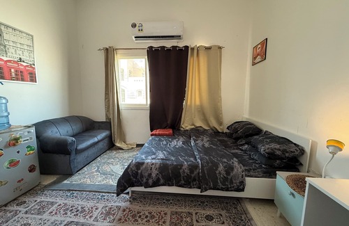 Al Khalidiyah Apartment | Cozy bedroom with WiFi in peaceful Abu DhabinPlz contact me before confirming