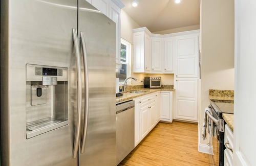 East Hill House | Cozy Carriage House with Pool, Bikes, and Charming Neighborhood