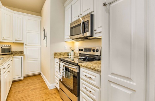 East Hill House | Cozy Carriage House with Pool, Bikes, and Charming Neighborhood