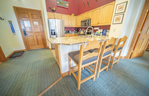 Mountain House Condo | Cozy condo with views of the snowy mountains!