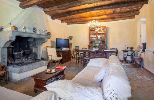 Piazza al Serchio House | Cozy cottage with fireplace and stunning views.