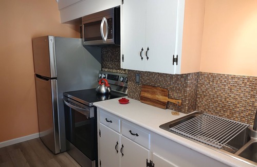 Supply Cottage | Cozy Cottage one mile from the Beach and Boat Ramp! Pet Friendly Too!