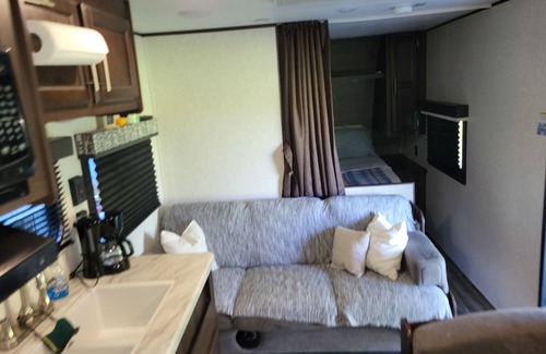Evans Mills RV Rental | Cozy Country Camper!
