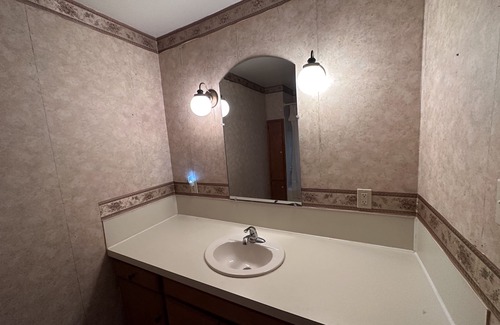 Paris House | Cozy getaway located less than half a mile from the Historic Paris Town Square