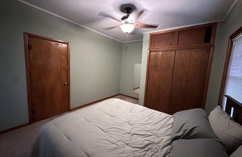 Paris House | Cozy getaway located less than half a mile from the Historic Paris Town Square