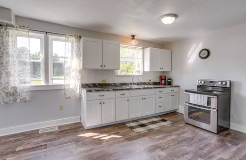 New Haven Huron County House | Cozy Greenwich Vacation Rental w/Fire Pit