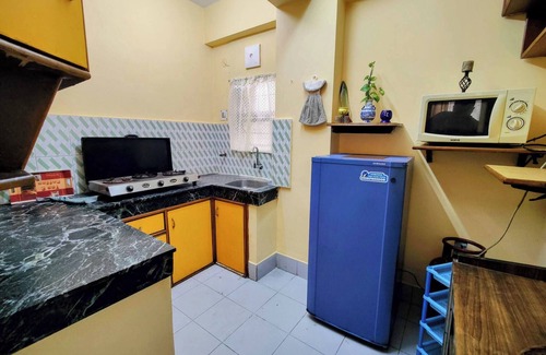 Sualkuchi Apartment | Cozy Guwahati Apartment With City & Mountain Views