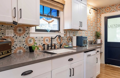 Encanto House | Cozy historic home centrally located. Pet friendly! Beautiful outdoor fireplace.