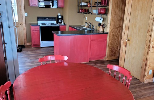 Comstock Cabin | Cozy Lakefront Cabin w/canoe, hammock, fire-pit & grill! Perfect group getaway