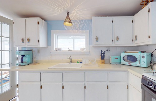 Town of Ledyard House | Cozy lakeside escape with screened porch, deck, & AC