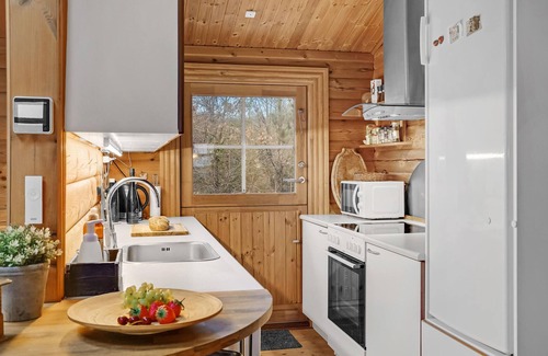 Bønnerup Strand House | Cozy log cabin with a panoramic view