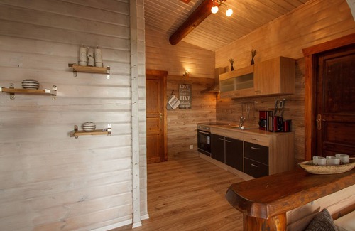 Steina House | Cozy log cabin with 2 apartments on a slope in a quiet location