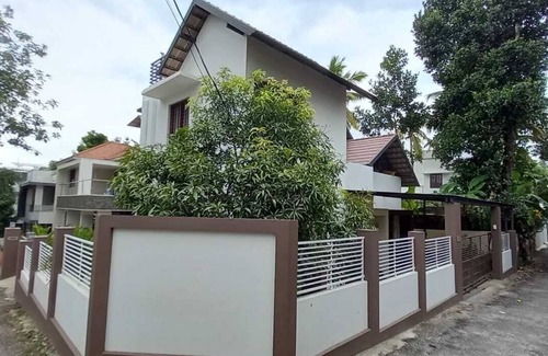 Nedumangad House | Cozy modern hideout on the outskirts of city help you freak out in silence .