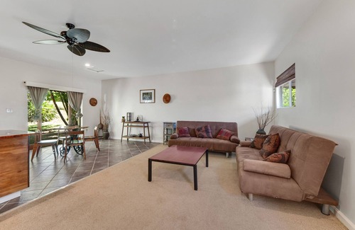 Honokaa House | Cozy Ohana suite with private patio, deck, & tropical garden setting