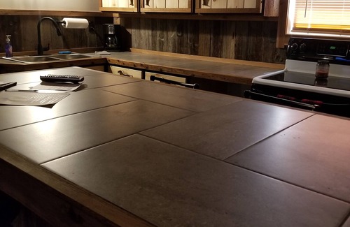 Walhalla Cabin | Cozy, open concept barnwood cabin with pool table & shuffleboard near PM river!