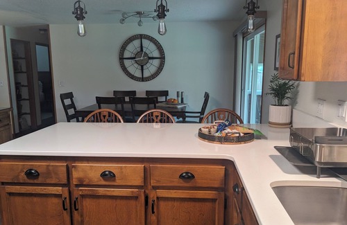 Dundee House | Cozy place for families, couples & friends. Hot tub awaits. Central to activity.