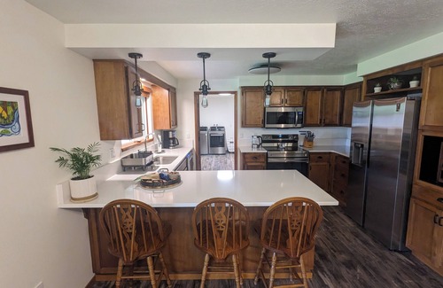 Dundee House | Cozy place for families, couples & friends. Hot tub awaits. Central to activity.