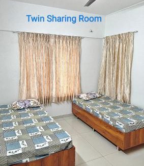 Pune House | Cozy & Premium Homestay Rooms near Bharati Vidyapeeth, Pune