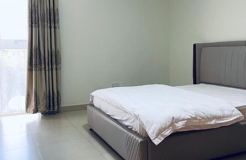 Entebbe House | Cozy Private Rooms in a furnished Penthouse with lake view