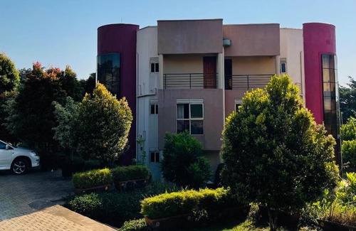 Entebbe House | Cozy Private Rooms in a furnished Penthouse with lake view