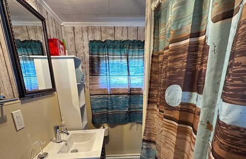 Jonesport House | Cozy ranch home situated off the main road overlooking Moosabec Reach.