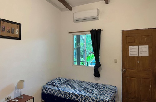 Tamanique Hotel | Cozy rooms with AC, WiFi and private bathroom in El Tunco. Close to the beach!