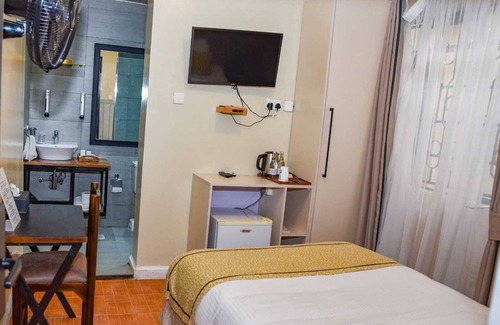 Muthaiga Hotel | Cozy Single Room in Prime Nairobi Hotel with Fitness Center Access