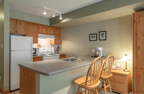 Silver Star Mountain Condo | Cozy slope side Creekside condo with views - steps from the ski way!