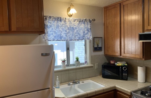 Arrowhead Villas Cabin | Cozy Stone Fireplace in a Relaxing 2 Bedroom Cabin