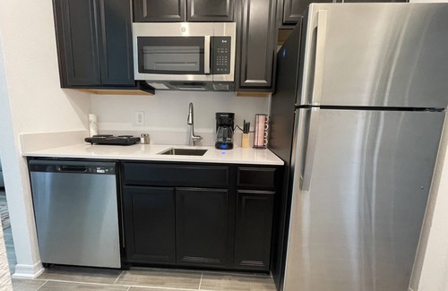 Haines City Apartment | Cozy Suites is near many theme parks, public golf clubs, beaches, and dining.