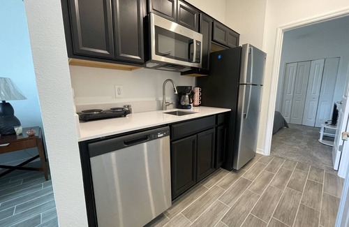 Haines City Apartment | Cozy Suites is near many theme parks, public golf clubs, beaches, and dining.