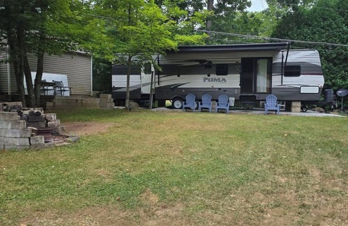 Lochmere RV Rental | Cozy Summer rental in a gated community campground on Lake Winnisquam