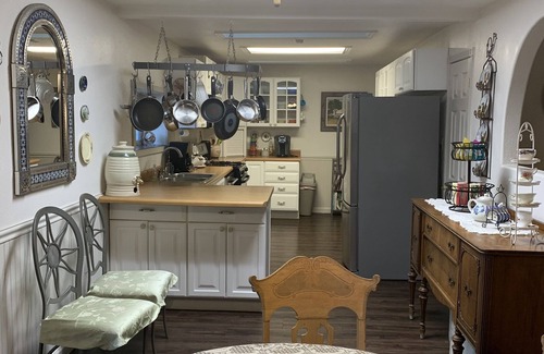 Monticello House | Cozy Victorian home with inviting front porch and fenced back yard pet friendly.