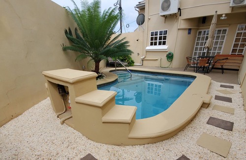 Bon Accord Village Condo | Cozy villa located 5 minutes from the airport and famous Pigeon Point beach.