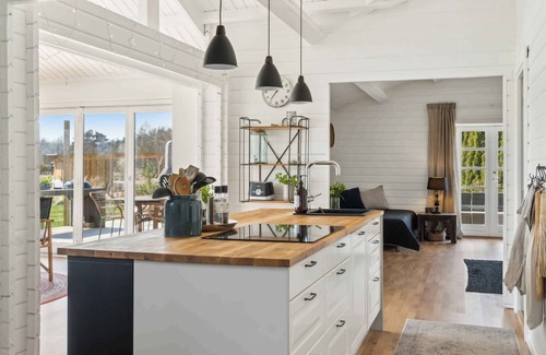 Marielyst House | Cozy wooden cottage with a great terrace