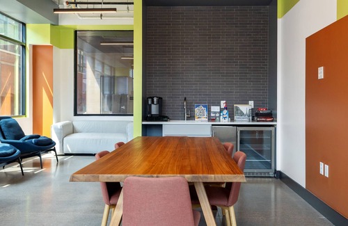 Lockerbie Square Apartment | CozySuites Mass with parking, lounge and roof deck 1