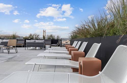 Warehouse District Apartment | CozySuites NLG with pool, bowling alley, sauna 27