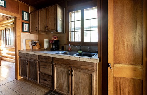 Idaho City Cabin | Creekside log cabin nestled between the pines of Idaho City