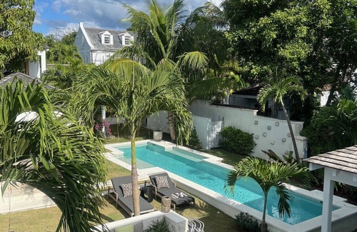 Dunmore Town House | Crown Affair: Village Compound on Charming Lane with 40' Pool & Sunset Views