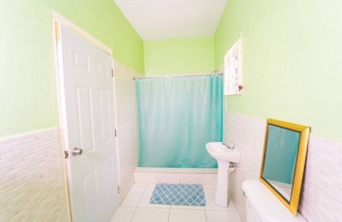 Bull Bay House | Cultural Oasis Bedroom