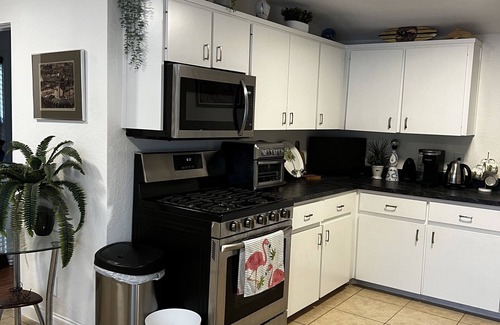 Edgewater House | Cute, comfortable home with a sunny front porch. 3 minute walk to the river.