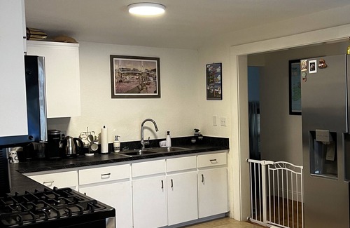 Edgewater House | Cute, comfortable home with a sunny front porch. 3 minute walk to the river.