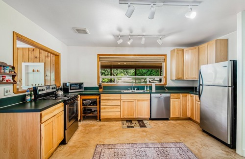 Clinton House | Darling Cottage in the Trees w/Free WiFi, Full Kitchen, Wood Stove, & Gas Grill