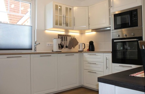 Born auf dem Darss Apartment | De Windroos - terrace, barbecue, beach chair, sun loungers, close to the Bodden, Baltic Sea 6km away, washing machine on request, WLAN