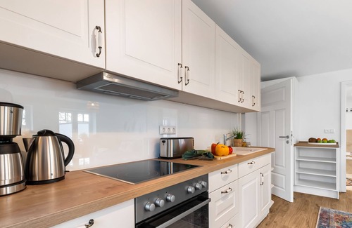 Hedwigenkoog House | Deichoase Holiday Home – Your New Retreat on the North Sea, Right by the Dike.