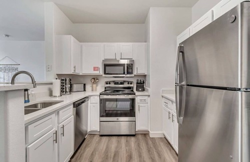 Clearfield Apartment | Delightful 2BR Apt with King Beds, Pool, Fitness Center, and Attached Garage, Close to Hill AFB